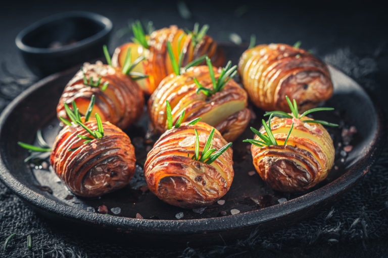 Freshly baked potatoes made with salt and rosemary